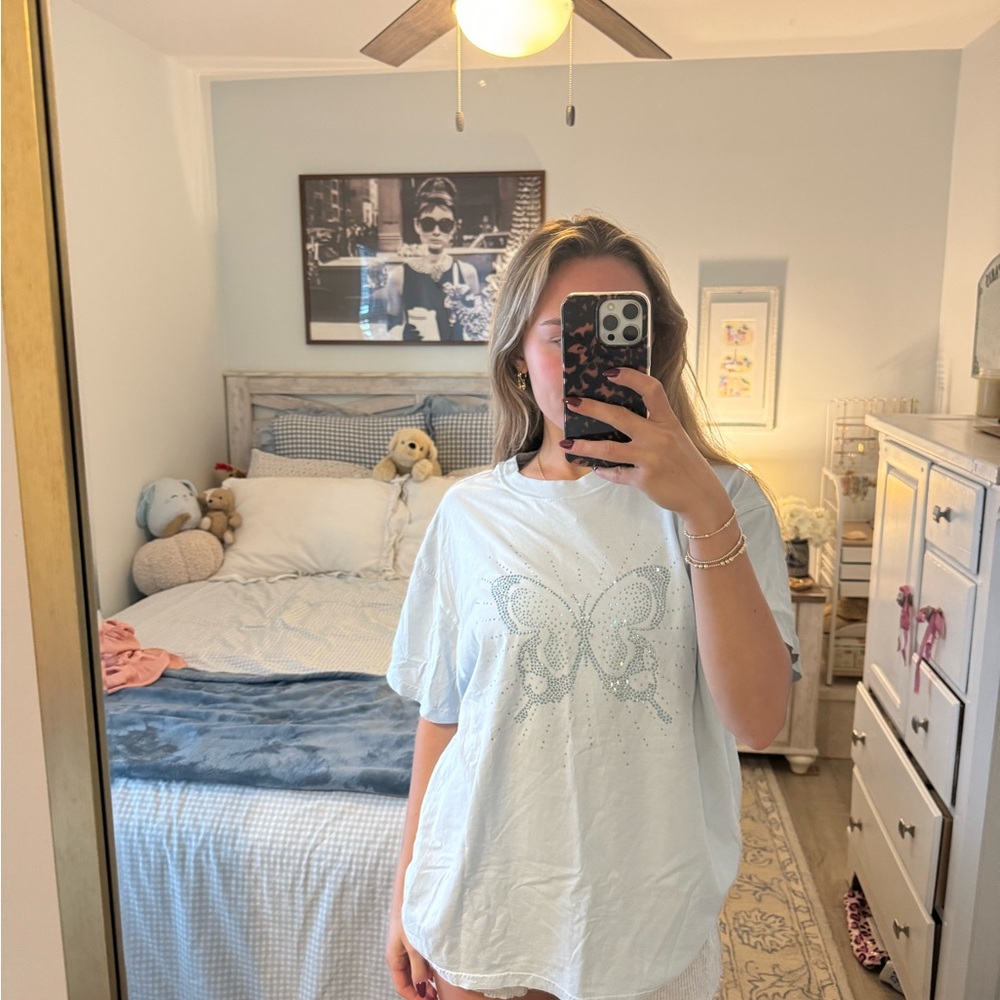 Aritzia light blue T-Shirt with sparkle Butterfly Design